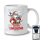 Personalized Don't Judge Santa In Training; Humorous Christmas Custom Name Pilot Santa T-Shirt