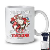 Personalized Don't Judge Santa In Training; Humorous Christmas Custom Name Trucker Santa T-Shirt