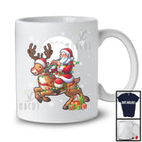 Santa Playing Oboe Riding Reindeer; Awesome Christmas Lights Oboe Player; Musical Instruments T-Shirt