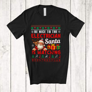 MacnyStore - Be Nice To The Electrician Santa Is Watching; Amusing Christmas Sweater Santa; Jobs Careers T-Shirt