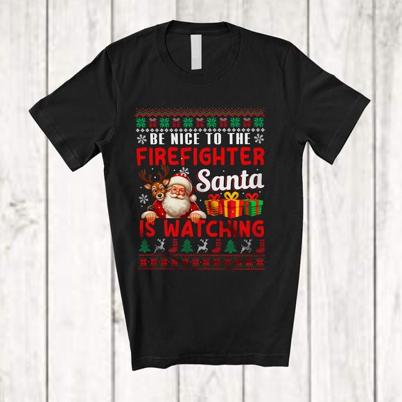 MacnyStore - Be Nice To The Firefighter Santa Is Watching; Amusing Christmas Sweater Santa; Jobs Careers T-Shirt