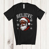 MacnyStore - Believe; Fantastic Christmas Black African Afro Santa Face; Snowing X-mas Family Group T-Shirt