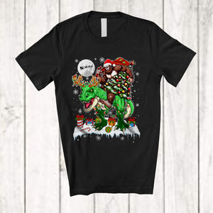 MacnyStore - Bigfoot Stole Christmas Tree; Humorous Snow Sasquatch Santa Bigfoot Riding T-Rex; Dinosaur T-Shirt