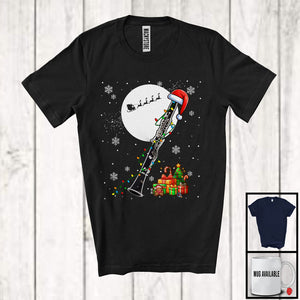 MacnyStore - Clarinet Santa; Amusing Christmas Lights Snowing Santa Clarinet Player; Musical Instruments T-Shirt