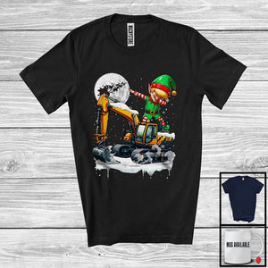 MacnyStore - Dabbing Elf On Excavator; Joyful Christmas Moon Snowing Elf; Excavator Driver Lover X-mas Group T-Shirt