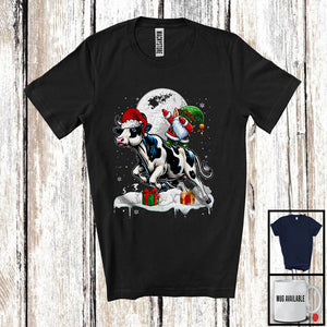 MacnyStore - Dabbing Gnome Riding Cow; Humorous Christmas Snow Around Farm Animal; X-mas Farmer T-Shirt