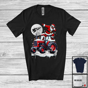 MacnyStore - Dabbing Santa On Tractor; Joyful Christmas Moon Snowing Santa; Tractor Driver Lover T-Shirt