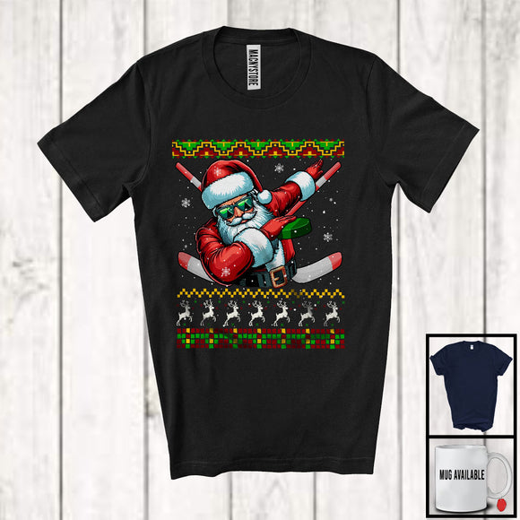 MacnyStore - Dabbing Santa Playing Ice Hockey Under Snow, Joyful Christmas Sweater Ice Hockey Player Group T-Shirt