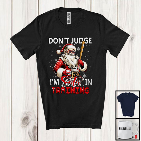 MacnyStore - Don't Judge I'm Santa In Training; Sarcastic Christmas Baseball Santa; Snowing X-mas Family T-Shirt