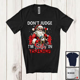 MacnyStore - Don't Judge I'm Santa In Training; Sarcastic Christmas Firefighter Santa; Snowing X-mas Family T-Shirt