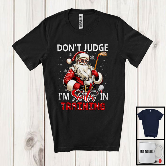 MacnyStore - Don't Judge I'm Santa In Training; Sarcastic Christmas Golf Santa; Snowing X-mas Family T-Shirt