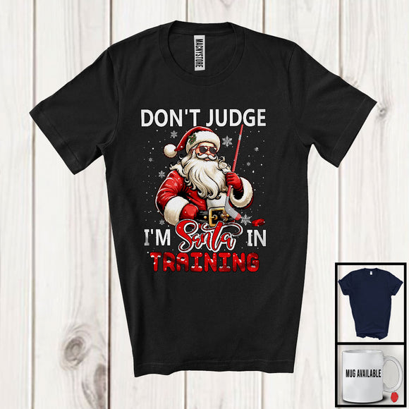 MacnyStore - Don't Judge I'm Santa In Training; Sarcastic Christmas Ice Hockey Santa; Snowing X-mas Family T-Shirt