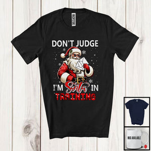 MacnyStore - Don't Judge I'm Santa In Training; Sarcastic Christmas Postal Worker Santa; Snowing X-mas Family T-Shirt