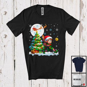 MacnyStore - Elf Playing Softball Team; Cheerful Christmas Tree Lights Snowing; X-mas Sport Player T-Shirt