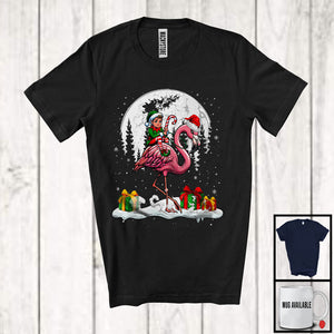 MacnyStore - Elf Riding Flamingo Santa; Joyful Christmas Moon Elf Flamingo; Matching X-mas Animal Lover T-Shirt