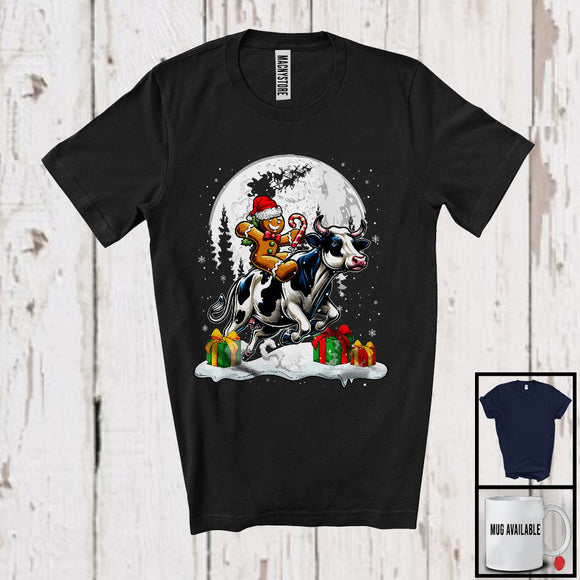 MacnyStore - Gingerbread Man Riding Cow; Joyful Christmas Moon Animal Lover; Snowing Around T-Shirt