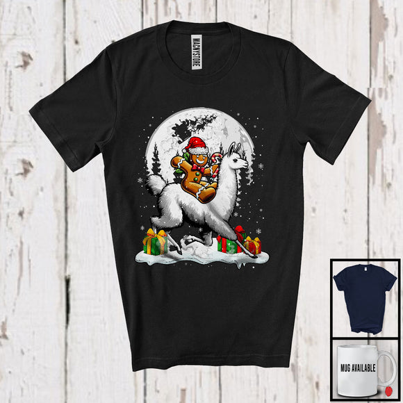 MacnyStore - Gingerbread Man Riding Llama; Joyful Christmas Moon Animal Lover; Snowing Around T-Shirt