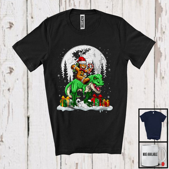 MacnyStore - Gingerbread Man Riding T Rex; Joyful Christmas Moon Animal Lover; Snowing Around T-Shirt