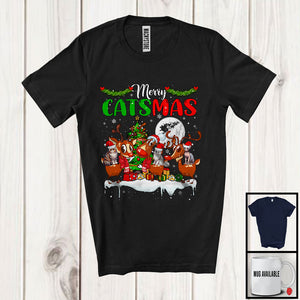 MacnyStore - Happy Catsmas; Amazing Christmas Three Kittens Riding Reindeer Snow; X-mas Tree Moon T-Shirt