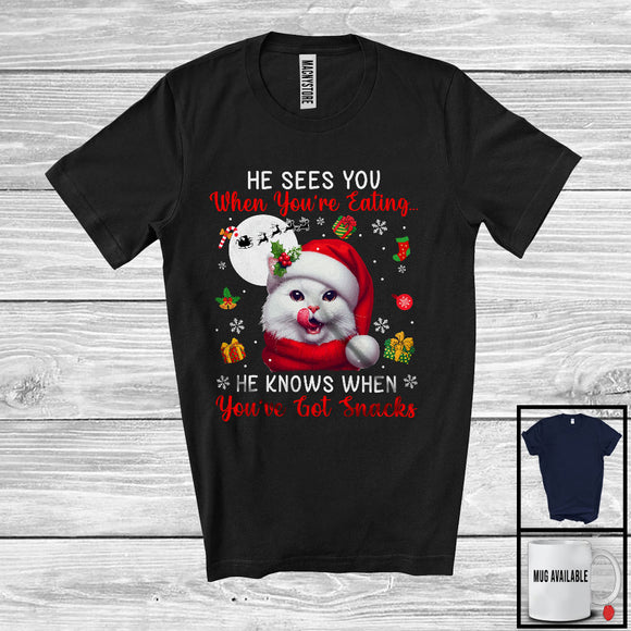 MacnyStore - He Sees You When You're Eating; Humorous Christmas Santa Cat; X-mas Moon Snow T-Shirt