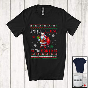 MacnyStore - I Still Believe In Santa; Humorous Christmas Lights Sweater Santa Lover; Pajamas Family Group T-Shirt