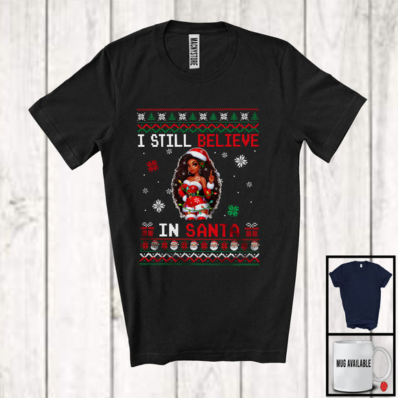 MacnyStore - I Still Believe In Santa; Humorous Christmas Sweater Afro Women Santa; Black African Family T-Shirt