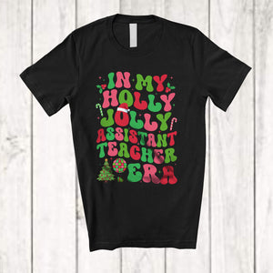 MacnyStore - In My Holly Jolly Assistant Teacher Era; Fantastic Christmas Groovy Santa; Jobs Family Group T-Shirt