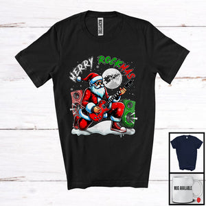 MacnyStore - Merry Rockmas; Joyful Christmas Moon Santa Playing Guitar; X-mas Rock Music Guitarist T-Shirt