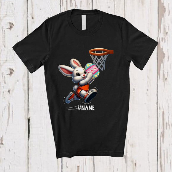 MacnyStore - Personalized Bunny Playing Basketball Eggs; Joyful Easter Custom Name Sport Player Team T-Shirt