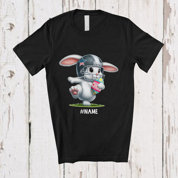 MacnyStore - Personalized Bunny Playing Football Eggs; Joyful Easter Custom Name Sport Player Team T-Shirt