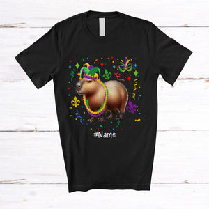 MacnyStore - Personalized Capybara With Mardi Gras Beads Jester Hat; Lovely Custom Name Rodent Animal T-Shirt