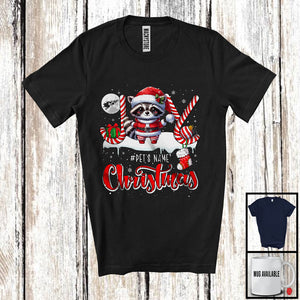 MacnyStore - Personalized Christmas; Joyful X-mas Custom Name Santa Raccoon; Candy Cane Snowing T-Shirt