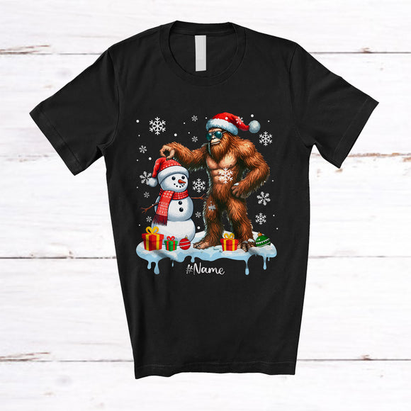 MacnyStore - Personalized Custom Name Bigfoot Build Snowman; Lovely Snow Santa Bigfoot; Family T-Shirt