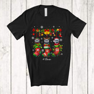 MacnyStore - Personalized Custom Name British Shorthair Cat In Three Christmas Socks; Lovely X-mas Lights Snow T-Shirt