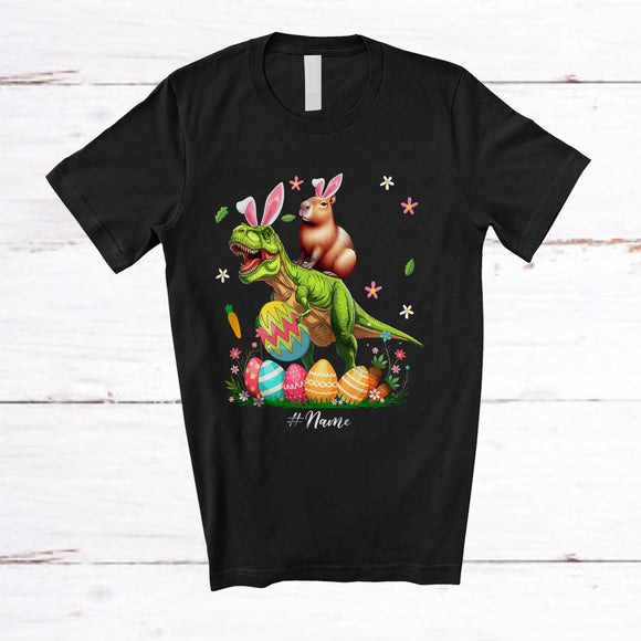 MacnyStore - Personalized Custom Name Capybara Ridding T-Rex; Amazing Easter Eggs Hunting; Family T-Shirt