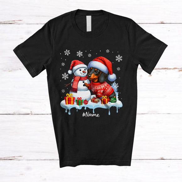 MacnyStore - Personalized Custom Name Dachshund Build Snowman; Lovely Snow Santa Dachshund; Family T-Shirt