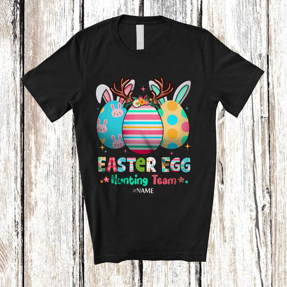 MacnyStore - Personalized Custom Name Easter Egg Hunting Team; Colorful Easter Three Reindeer Bunny Eggs T-Shirt