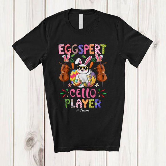 MacnyStore - Personalized Custom Name Eggspert Cello Player; Joyful Easter Egg Expert; Musical Instrument T-Shirt