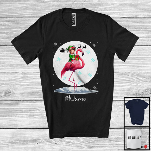MacnyStore - Personalized Custom Name Elf Riding Flamingo, Joyful Christmas Moon Snow Flamingo, X-mas Team T-Shirt