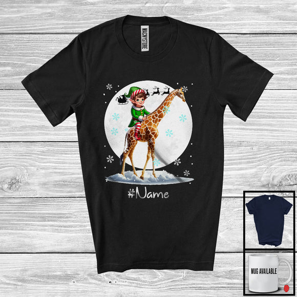 MacnyStore - Personalized Custom Name Elf Riding Giraffe, Joyful Christmas Moon Snow Giraffe, X-mas Team T-Shirt