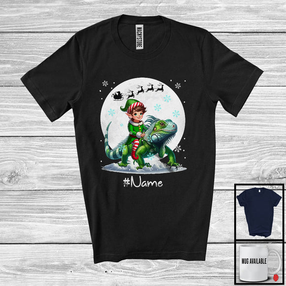 MacnyStore - Personalized Custom Name Elf Riding Iguana, Joyful Christmas Moon Snow Iguana, X-mas Team T-Shirt