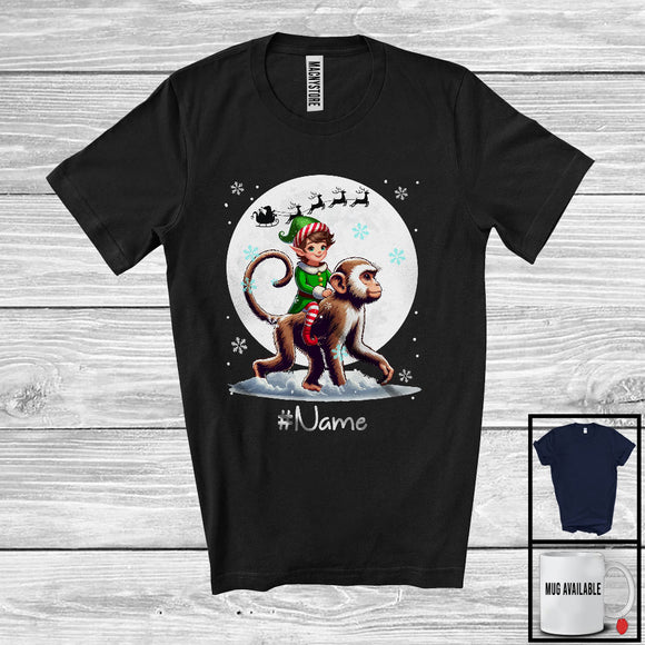 MacnyStore - Personalized Custom Name Elf Riding Monkey, Joyful Christmas Moon Snow Monkey, X-mas Team T-Shirt