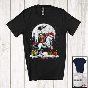 MacnyStore - Personalized Custom Name Elf Riding Unicorn Santa; Cheerful Christmas Snowing; Animal Lover T-Shirt