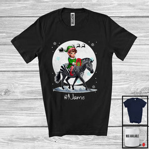 MacnyStore - Personalized Custom Name Elf Riding Zebra, Joyful Christmas Moon Snow Zebra, X-mas Team T-Shirt
