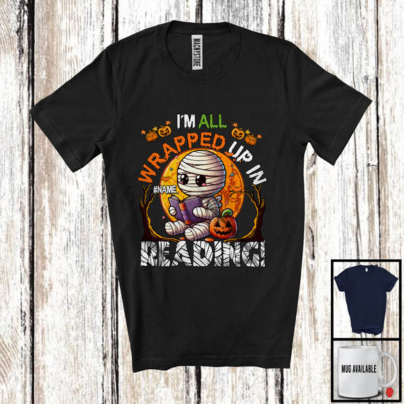 MacnyStore - Personalized Custom Name I'm All Wrapped Up In Reading; Scary Halloween Moon Mummy Book Nerd T-Shirt