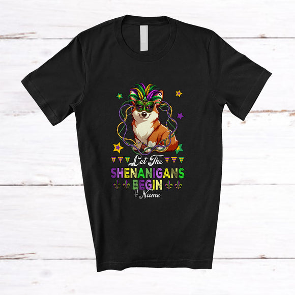 MacnyStore - Personalized Custom Name Let The Shenanigans Begin; Joyful Mardi Gras Masked Corgi Beads T-Shirt