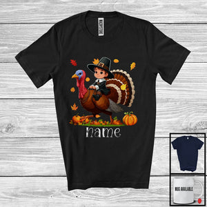 MacnyStore - Personalized Custom Name Pilgrim Boy Riding Turkey; Lovely Thanksgiving Pumpkin; Boys Family T-Shirt