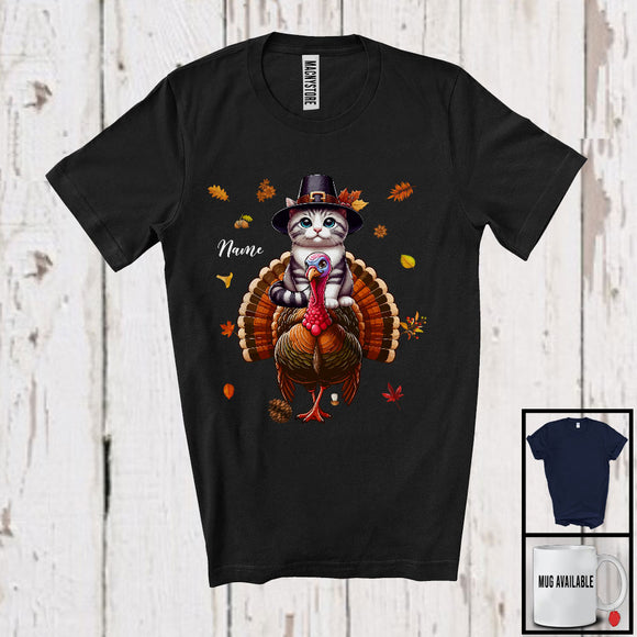 MacnyStore - Personalized Custom Name Pilgrim Cat Riding Turkey; Lovely Thanksgiving Fall Leaves T-Shirt