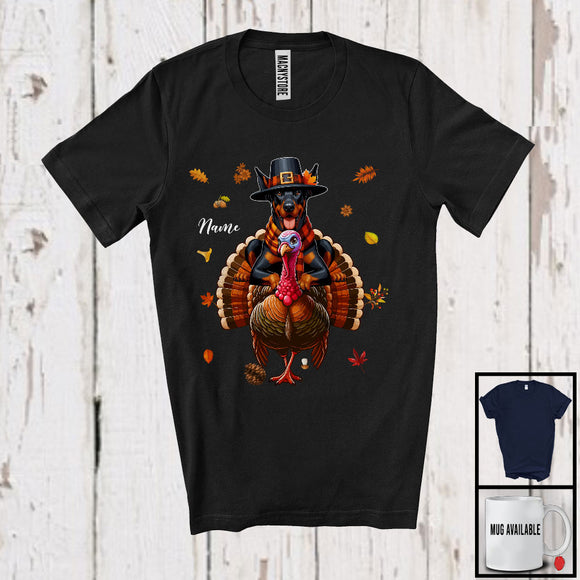 MacnyStore - Personalized Custom Name Pilgrim Dobermann Riding Turkey; Lovely Thanksgiving Fall Leaves T-Shirt