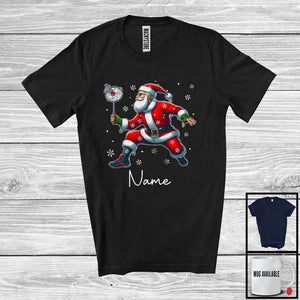 MacnyStore - Personalized Custom Name Santa Playing Badminton, Joyful Christmas Sport Player, X-mas Team T-Shirt